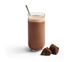 A glass of prepared Optavia Ascend Chocolate Shake Mix.